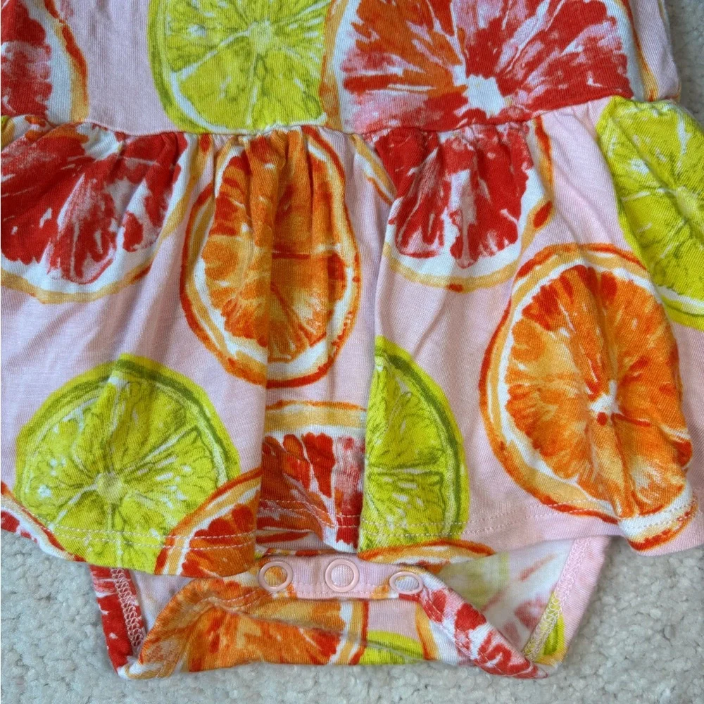 Posh Peanut Flutter Sleeve Twirl Bodysuit in a Citrus print - Picture 3 of 7